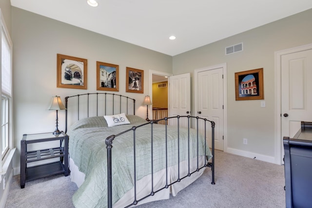 bedroom with recessed lighting, baseboards, visible vents, and carpet flooring