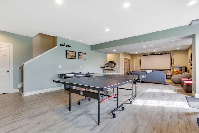 rec room featuring light wood-type flooring, baseboards, and recessed lighting