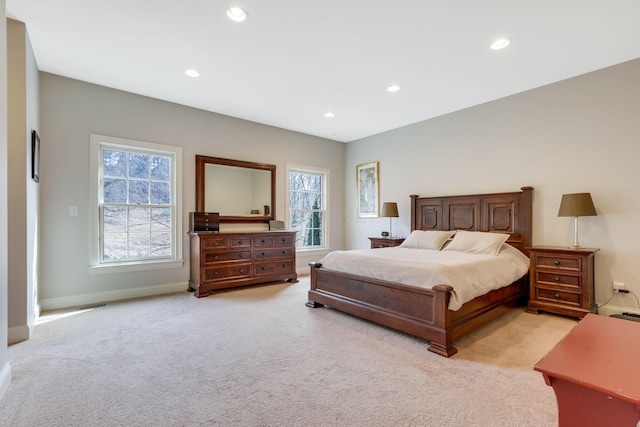 bedroom featuring recessed lighting, baseboards, and light colored carpet