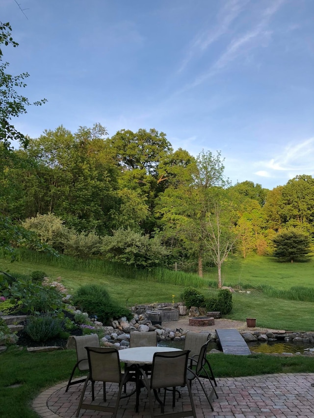 view of patio featuring outdoor dining area