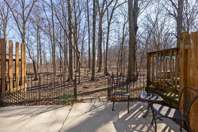 view of patio featuring fence