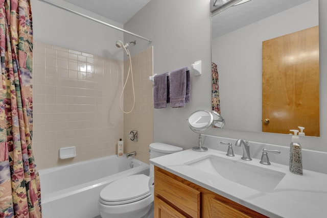 full bath with toilet, a textured ceiling, shower / bath combination with curtain, and vanity