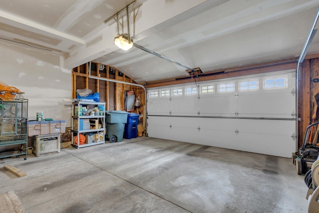 garage featuring a garage door opener