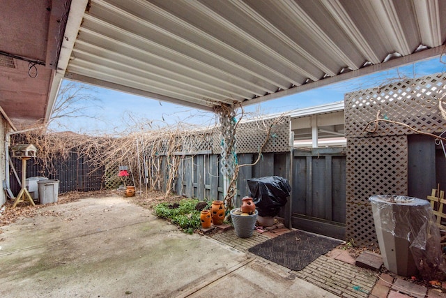 view of patio featuring a fenced backyard and area for grilling