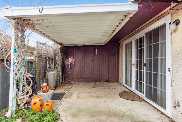 view of patio featuring a carport