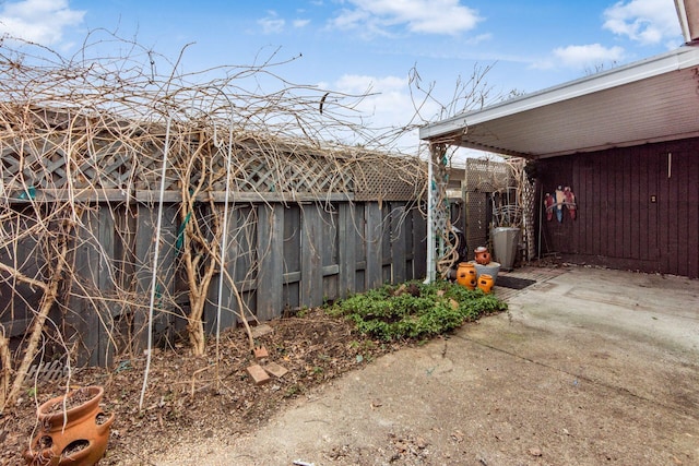 view of yard with a patio area and fence