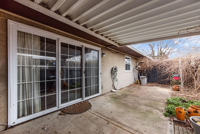 view of patio featuring fence