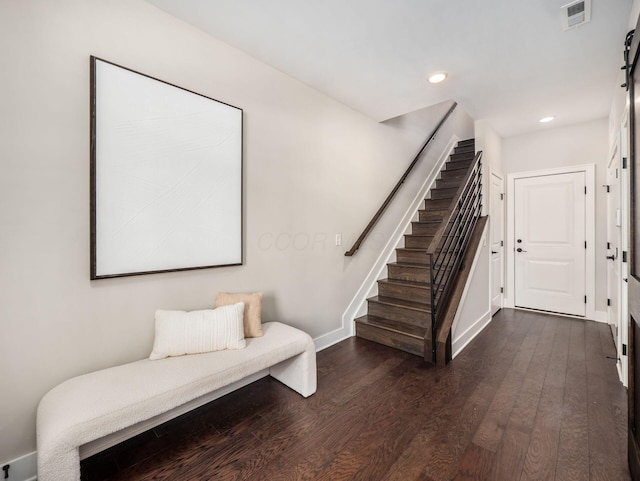 entryway featuring visible vents, dark wood-type flooring, recessed lighting, stairway, and baseboards