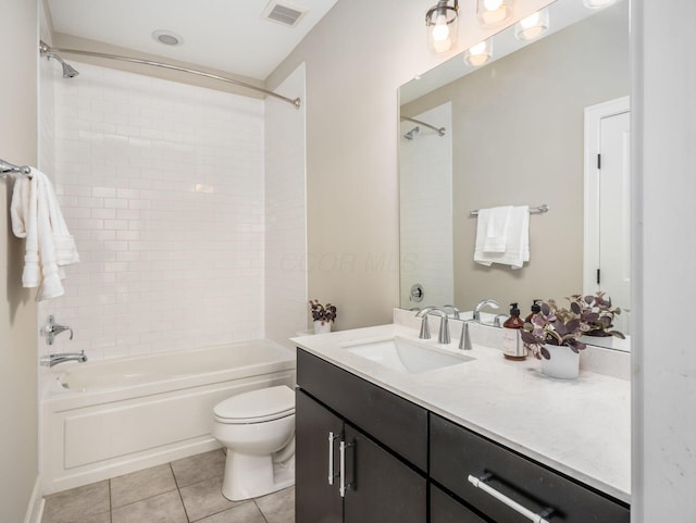 full bath with tile patterned flooring, visible vents, toilet, bathing tub / shower combination, and vanity