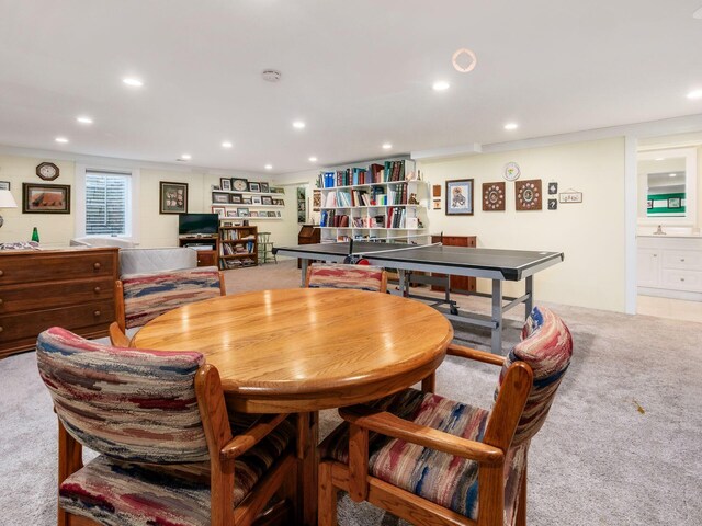 rec room featuring recessed lighting and light colored carpet