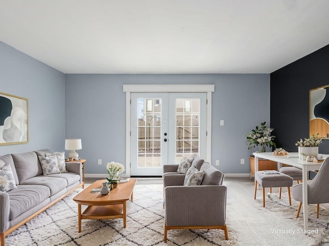 living area with carpet, french doors, and baseboards