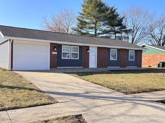 single story home with driveway, roof with shingles, an attached garage, a front lawn, and brick siding