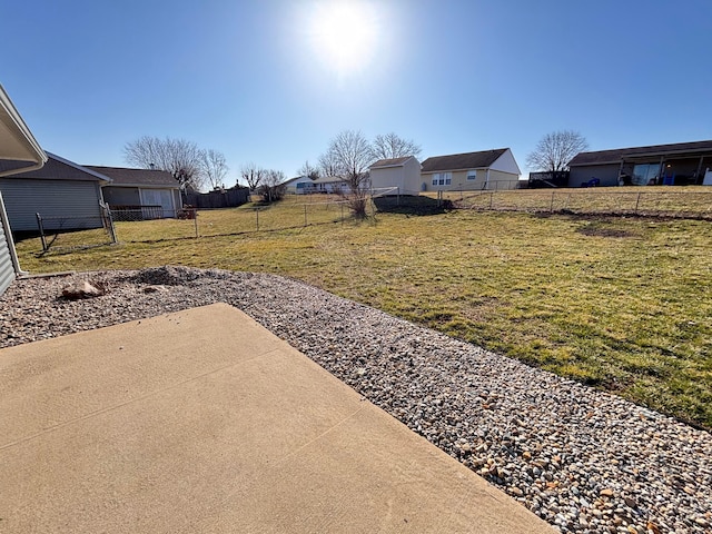 view of yard with a patio area and a fenced backyard