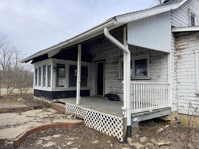 doorway to property with a porch