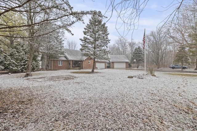 view of front of home featuring brick siding