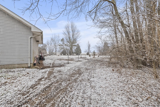 view of snowy yard