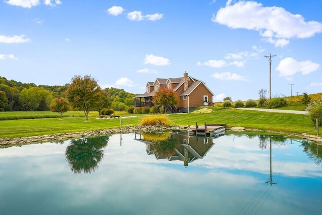 water view with a floating dock