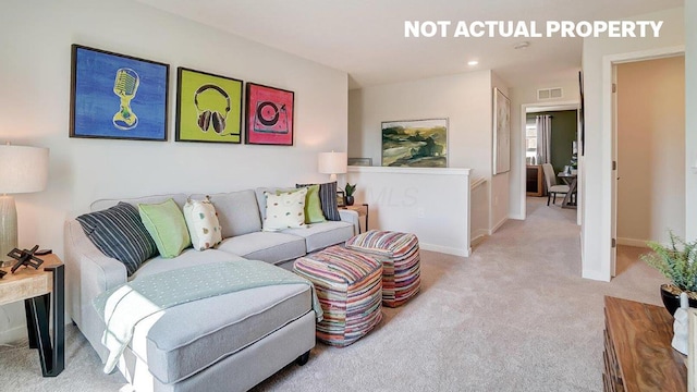 living area with recessed lighting, baseboards, and light colored carpet