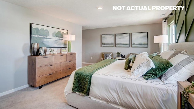 bedroom with visible vents, baseboards, and light carpet