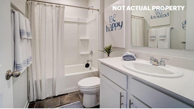 full bath featuring vanity, visible vents, tile patterned flooring, shower / bath combo with shower curtain, and toilet