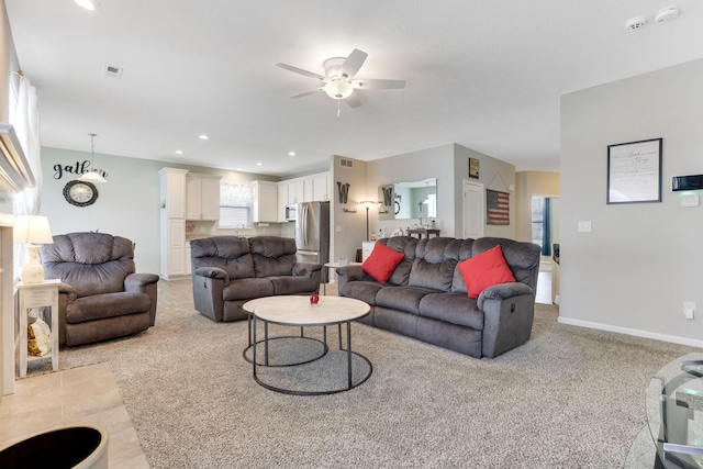 living room featuring visible vents, recessed lighting, baseboards, and ceiling fan