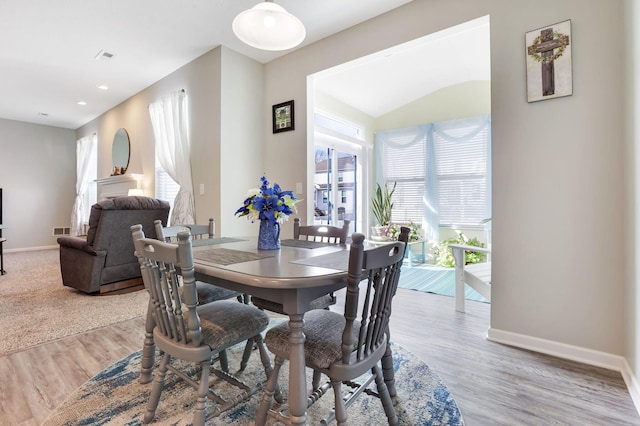 dining space featuring recessed lighting, visible vents, baseboards, and light wood-style floors