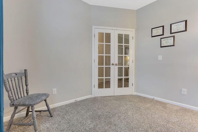 unfurnished room featuring french doors, baseboards, and carpet floors