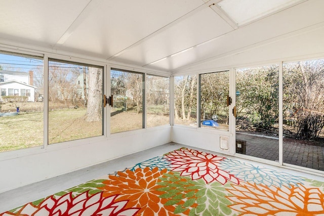 unfurnished sunroom featuring a wealth of natural light