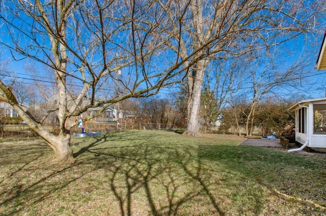 view of yard featuring fence