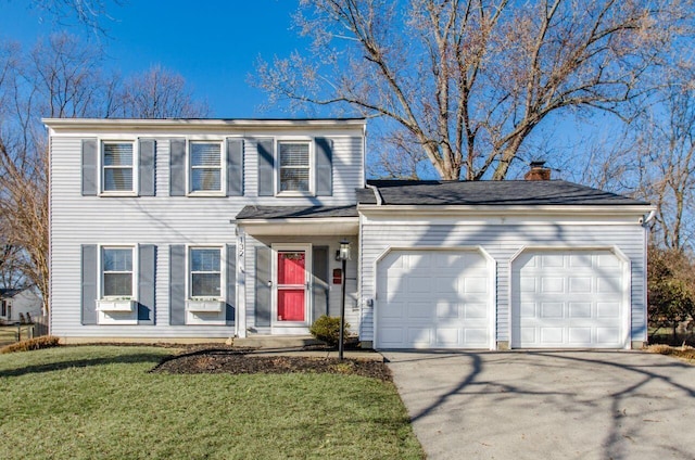 view of front of house with a front lawn, driveway, a chimney, and a garage