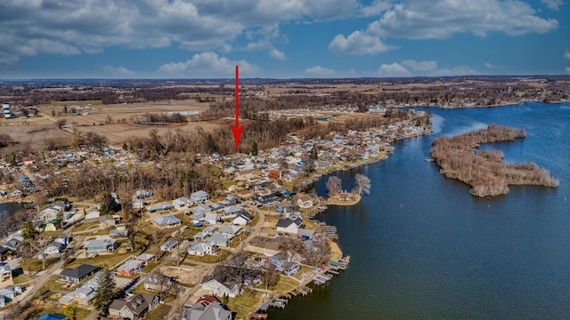 bird's eye view with a residential view and a water view