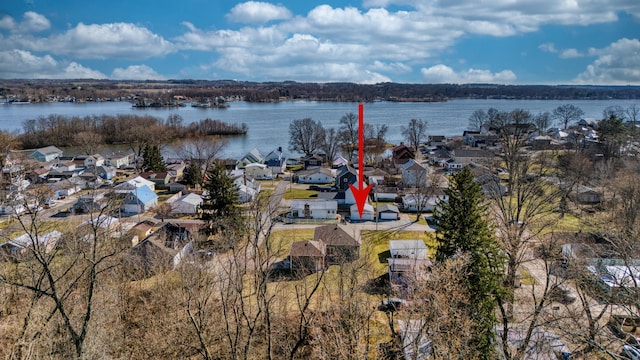 aerial view featuring a residential view and a water view