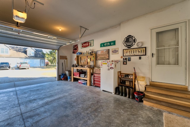 garage featuring a garage door opener