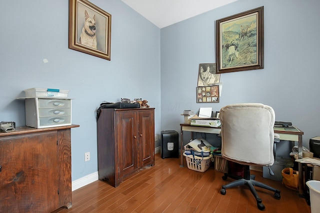 office with baseboards and wood finished floors