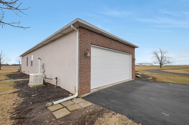 garage with driveway