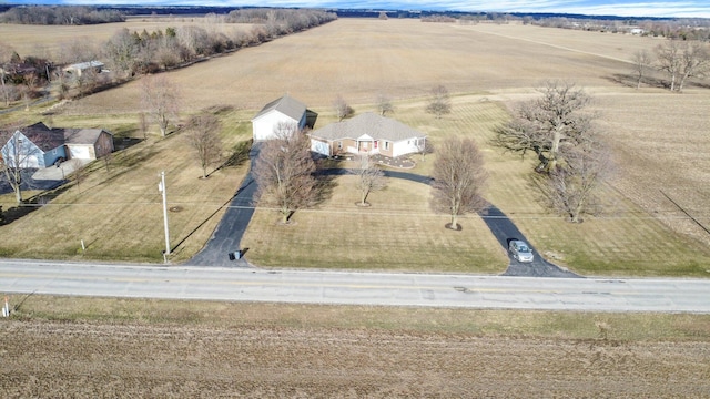 birds eye view of property featuring a rural view