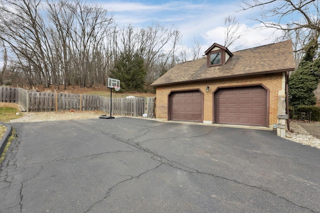 detached garage with fence