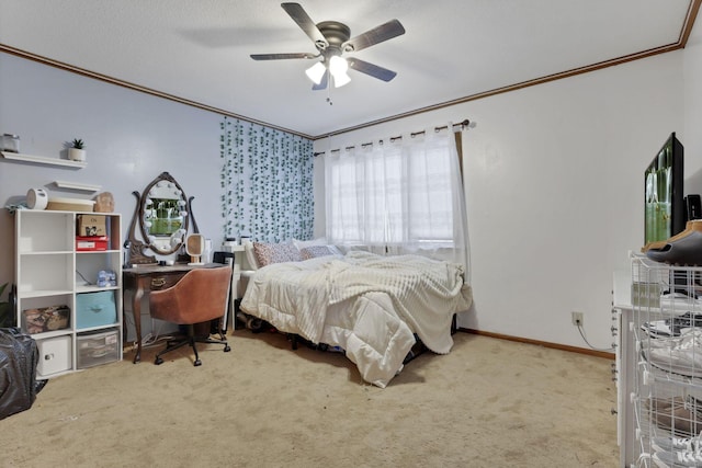 carpeted bedroom featuring ceiling fan, ornamental molding, a textured ceiling, and baseboards