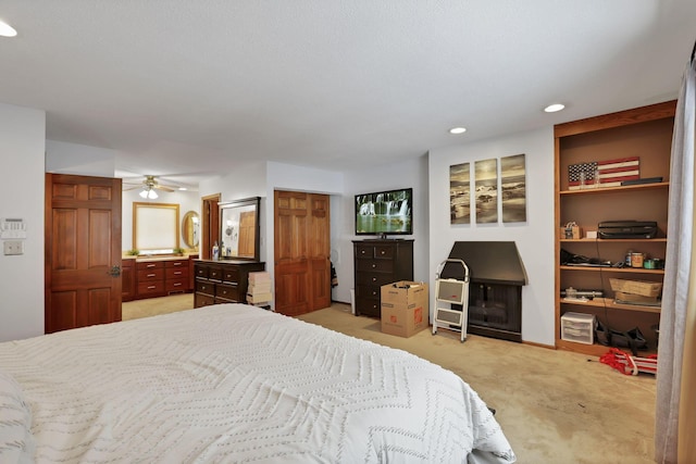 bedroom featuring recessed lighting and light colored carpet