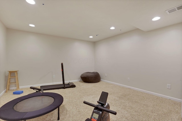 workout area featuring recessed lighting, visible vents, and carpet flooring