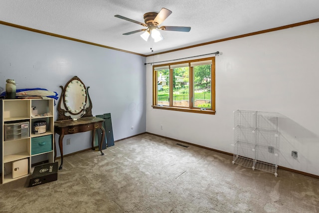 671 Carriage Ct, Newark, OH 43055 - bedroom with ornamental molding, carpet floors, baseboards, a textured ceiling, and ceiling fan
