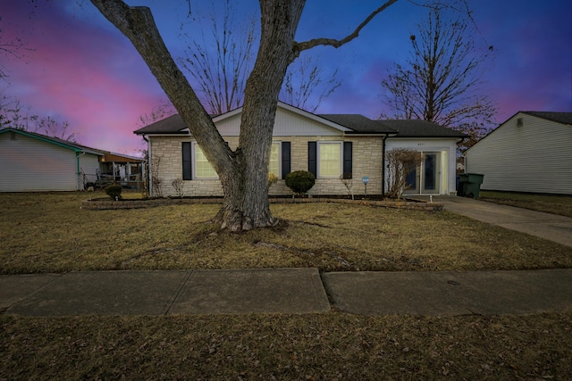 ranch-style house with brick siding