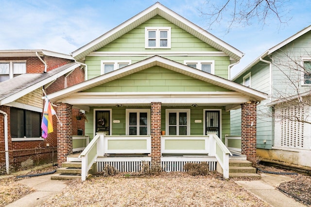 traditional style home with covered porch