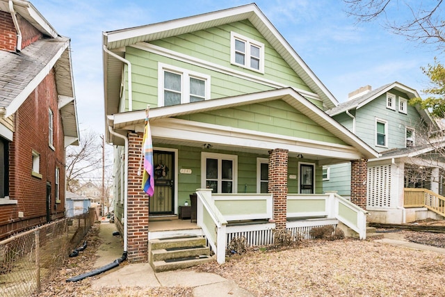 traditional style home with covered porch