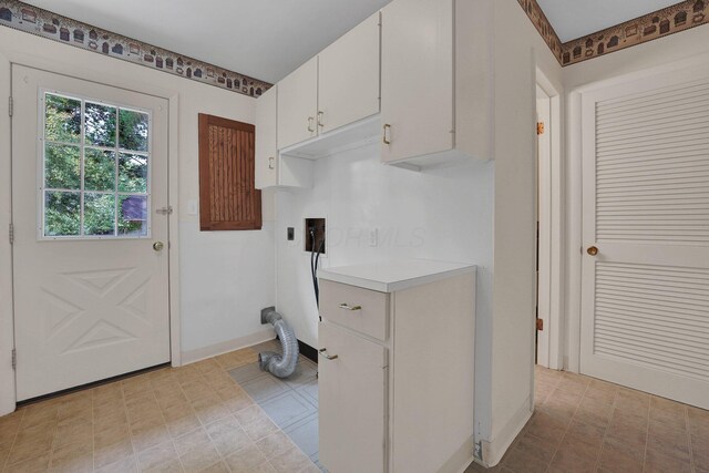 957 Sharon View Dr, Newark, OH 43055 - washroom with cabinet space, baseboards, and electric dryer hookup