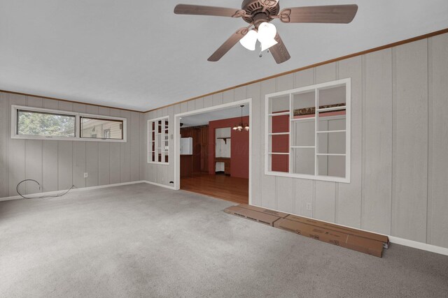 957 Sharon View Dr, Newark, OH 43055 - unfurnished room featuring carpet flooring, baseboards, crown molding, ceiling fan, and a chandelier