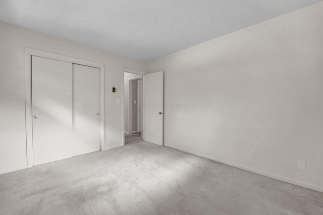 957 Sharon View Dr, Newark, OH 43055 - unfurnished bedroom featuring carpet flooring, a closet, and baseboards