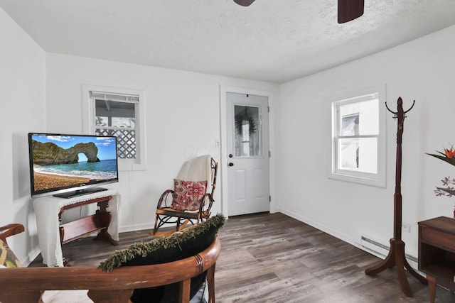 71 3rd St, Lancaster, OH 43130 - living area with a ceiling fan, wood finished floors, and a textured ceiling