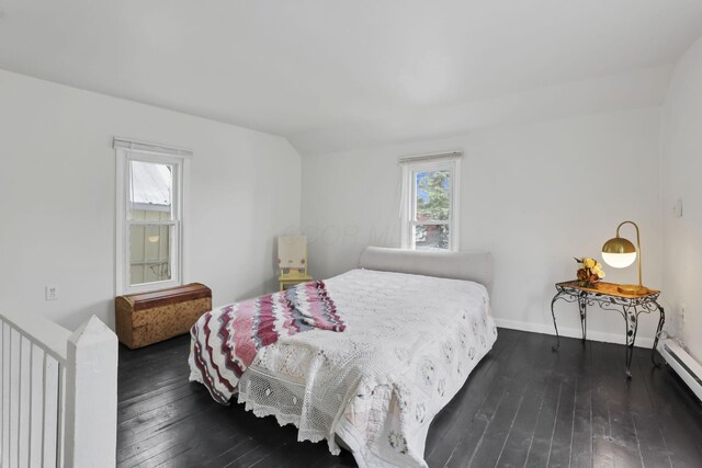 71 3rd St, Lancaster, OH 43130 - bedroom with a baseboard radiator and dark wood-type flooring