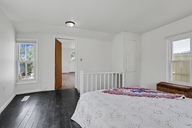 71 3rd St, Lancaster, OH 43130 - bedroom featuring multiple windows and dark wood-type flooring